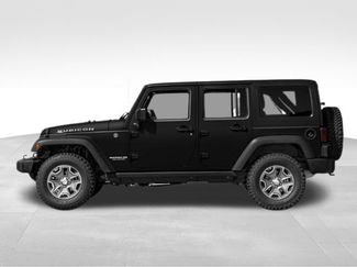 Used 2015 Jeep Wrangler Unlimited Rubicon w/ Dual Top Group AWD/4WD video 3