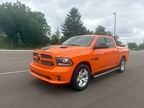 Used 2015 RAM 1500 Sport w/ Ignition Orange Sport Package AWD/4WD image 1