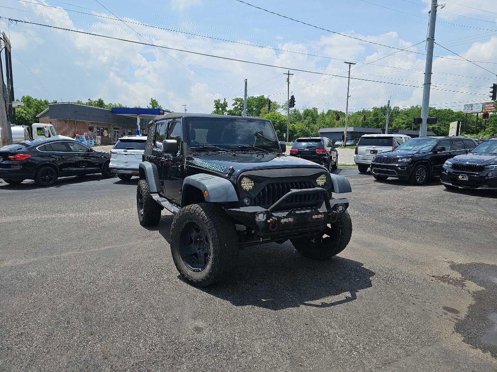 Used 2014 Jeep Wrangler Unlimited Rubicon w/ Connectivity Group AWD/4WD image 1