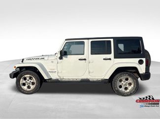 Used 2015 Jeep Wrangler Unlimited Sahara w/ Dual Top Group video 2