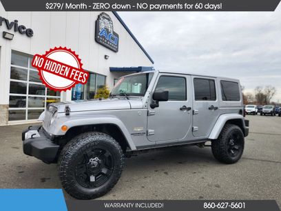 Used 2014 Jeep Wrangler Unlimited Sahara w/ Max Tow Package