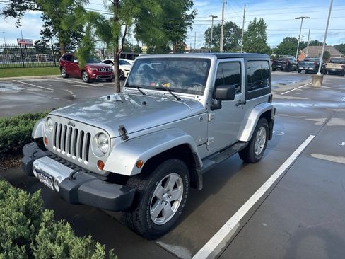 Used 2011 Jeep Wrangler Sahara w/ Dual Top Group AWD/4WD image 1