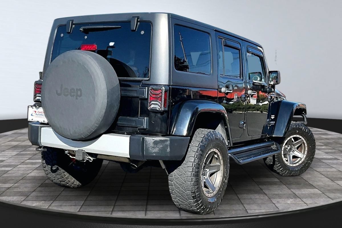 Used 2012 Jeep Wrangler Unlimited Sahara w/ Dual Top Group AWD/4WD image 5