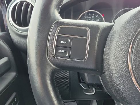Used 2013 Jeep Wrangler Unlimited Sahara w/ Dual Top Group AWD/4WD image 9