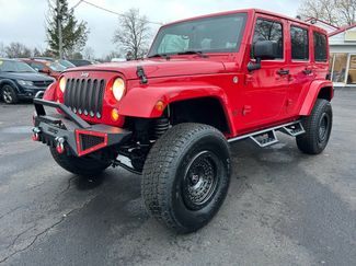 Used 2014 Jeep Wrangler Unlimited Sahara w/ Dual Top Group image 1