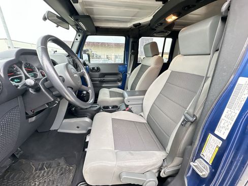 Used 2010 Jeep Wrangler Unlimited Rubicon w/ Dual Top Group AWD/4WD image 16