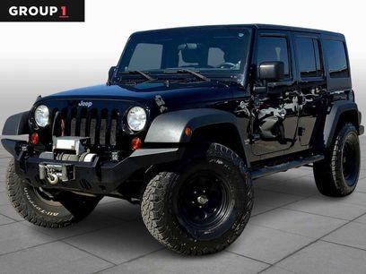 Used 2011 Jeep Wrangler Unlimited Sport