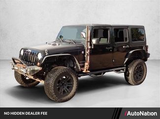 Used 2011 Jeep Wrangler Unlimited Sport AWD/4WD video 1