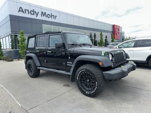 Used 2015 Jeep Wrangler Unlimited Sport w/ Mopar Black Appearance Group AWD/4WD image 1