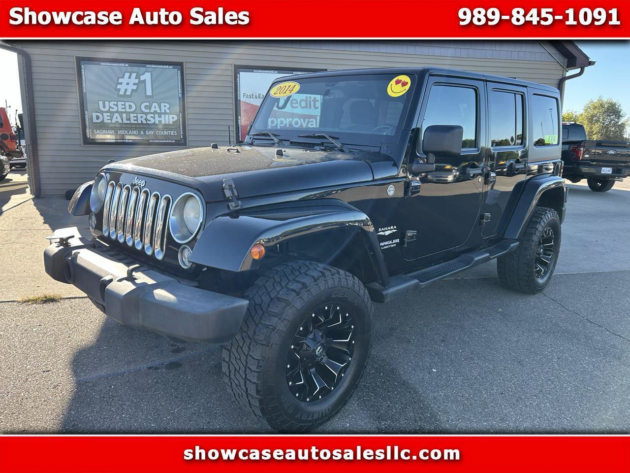 Used 2014 Jeep Wrangler Unlimited Sahara w/ Dual Top Group AWD/4WD image 1