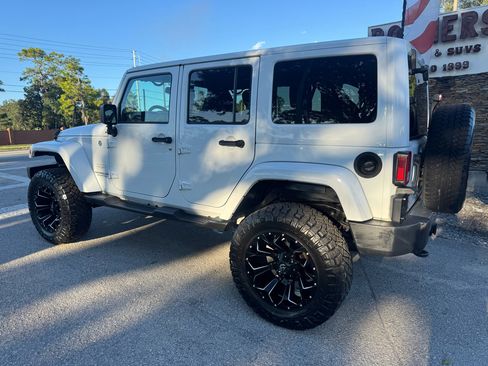 Used 2014 Jeep Wrangler Unlimited Sahara w/ Max Tow Package image 2