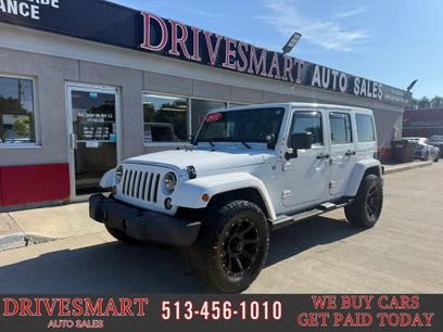 Used 2015 Jeep Wrangler Unlimited Sahara w/ Dual Top Group