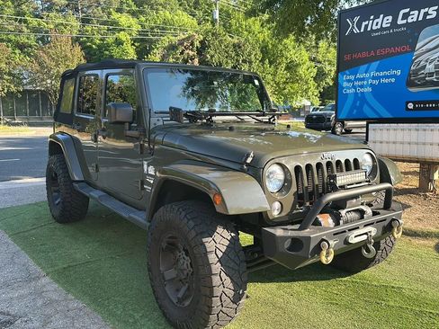 Used 2015 Jeep Wrangler Unlimited Sahara AWD/4WD image 1