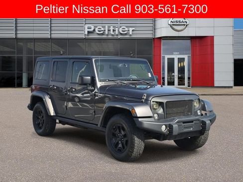 Used 2016 Jeep Wrangler Unlimited Sahara image 1