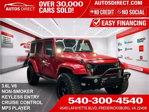 Used 2015 Jeep Wrangler Unlimited Sahara AWD/4WD image 1