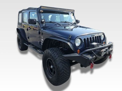 Used 2013 Jeep Wrangler Unlimited Sport w/ Trailer Tow Group AWD/4WD image 2