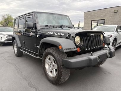 Used 2012 Jeep Wrangler Unlimited Rubicon w/ Dual Top Group