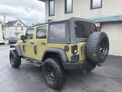 Used 2013 Jeep Wrangler Unlimited Sport w/ Mopar Black Appearance Group AWD/4WD image 3
