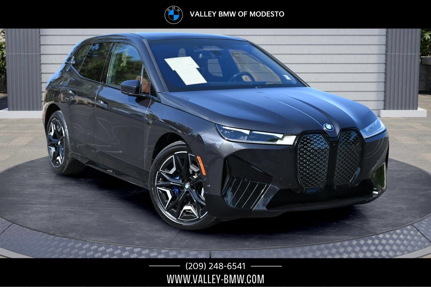 Certified 2024 BMW iX xDrive50 w/ Premium Package AWD/4WD image 1
