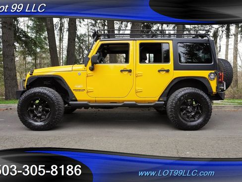 Used 2011 Jeep Wrangler Unlimited Sahara w/ Dual Top Group image 1