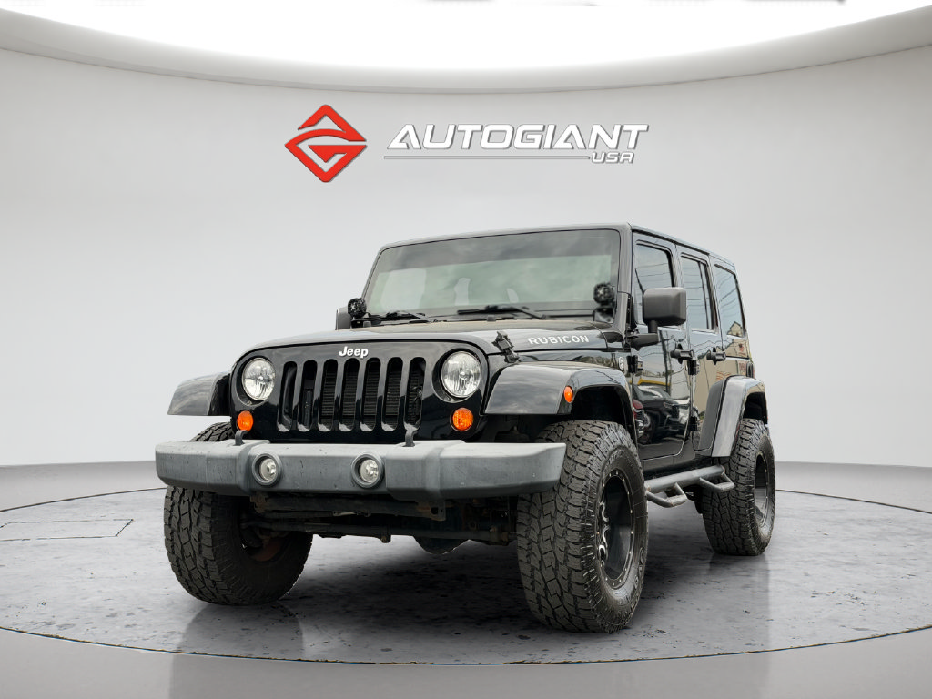Used 2012 Jeep Wrangler Unlimited Rubicon w/ Dual Top Group AWD/4WD image 1