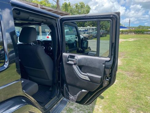 Used 2012 Jeep Wrangler Unlimited Sahara w/ Dual Top Group AWD/4WD image 20