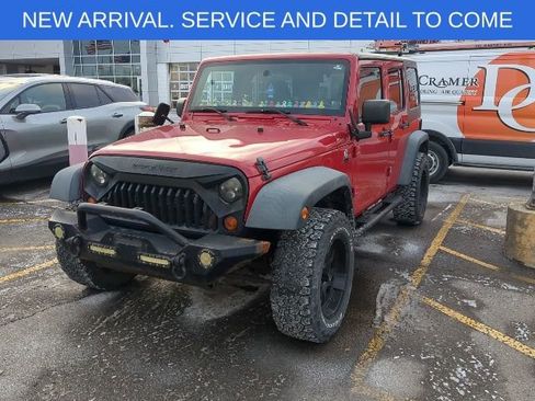 Used 2012 Jeep Wrangler Unlimited Sport image 1