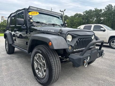 Used 2014 Jeep Wrangler Unlimited Rubicon w/ Connectivity Group AWD/4WD image 1