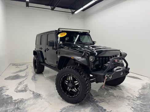 Used 2012 Jeep Wrangler Unlimited Rubicon AWD/4WD image 1