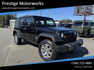 Used 2013 Jeep Wrangler Unlimited Sport image 1