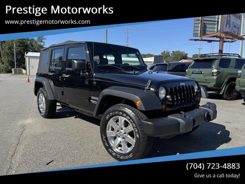 Used 2013 Jeep Wrangler Unlimited Sport image 1
