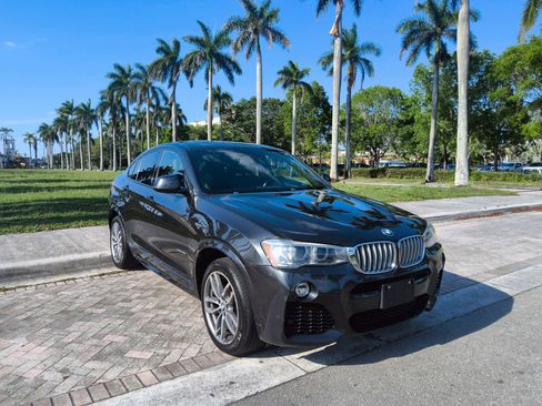 Used 2016 BMW X4 xDrive35i w/ Technology Package AWD/4WD image 1