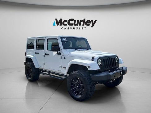 Used 2014 Jeep Wrangler Unlimited Sahara w/ Dual Top Group AWD/4WD image 1