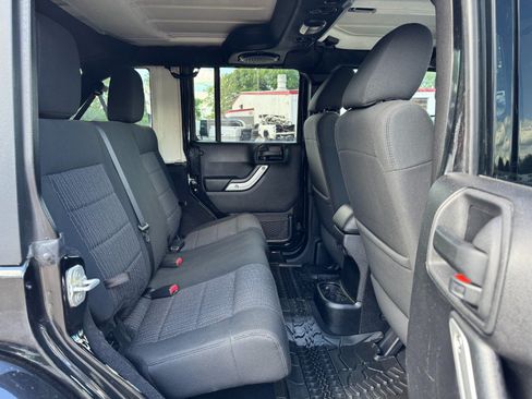 Used 2012 Jeep Wrangler Unlimited Sahara w/ Dual Top Group AWD/4WD image 18