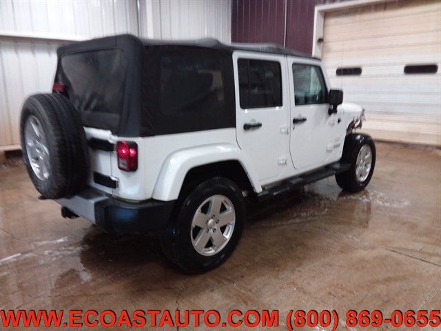 Used 2012 Jeep Wrangler Unlimited Sahara w/ Dual Top Group AWD/4WD image 2