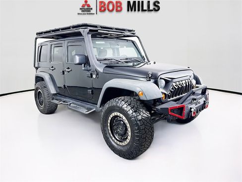 Used 2012 Jeep Wrangler Unlimited Sport w/ Connectivity Group image 1