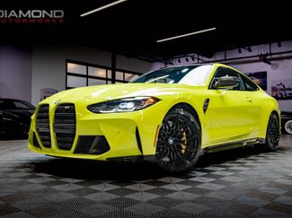 Used 2021 BMW M4 Coupe w/ M Carbon Exterior Package video 1