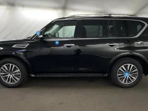 Certified 2023 Nissan Armada SL w/ Captain's Chairs Package AWD/4WD image 1