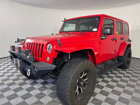 Used 2014 Jeep Wrangler Unlimited Sahara AWD/4WD image 1