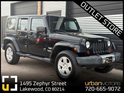 Used 2011 Jeep Wrangler Unlimited Sahara w/ Dual Top Group