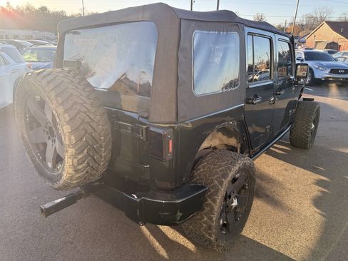 Used 2011 Jeep Wrangler Unlimited Rubicon w/ Dual Top Group AWD/4WD image 6