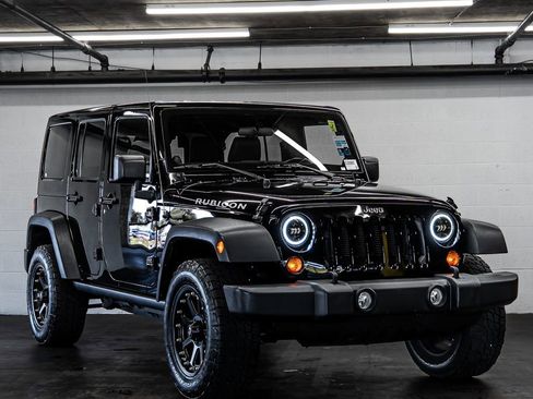 Used 2012 Jeep Wrangler Unlimited Rubicon w/ Dual Top Group AWD/4WD image 7