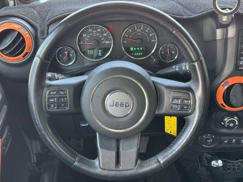 Used 2013 Jeep Wrangler Unlimited Sahara w/ Dual Top Group AWD/4WD image 9