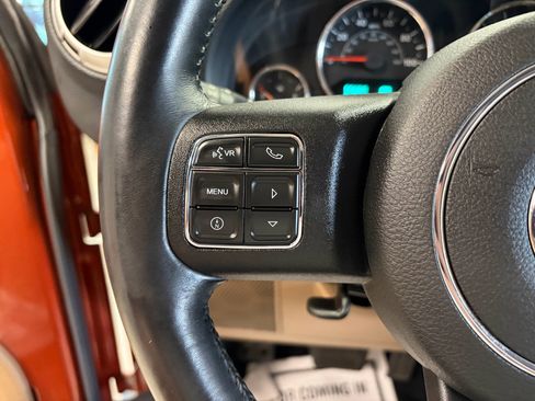 Used 2014 Jeep Wrangler Unlimited Sahara w/ Dual Top Group AWD/4WD image 11