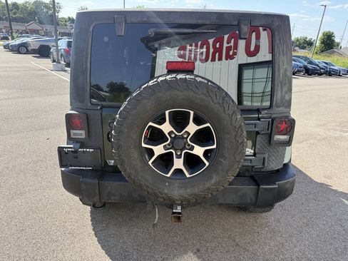 Used 2011 Jeep Wrangler Sahara w/ Dual Top Group AWD/4WD image 9