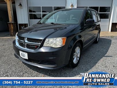 Used 2014 Dodge Grand Caravan SXT w/ Security Group