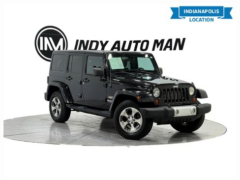Used 2012 Jeep Wrangler Unlimited Sahara w/ Trailer Tow Group image 1