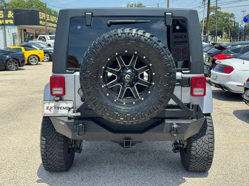 Used 2014 Jeep Wrangler Unlimited Sahara w/ Max Tow Package AWD/4WD image 3