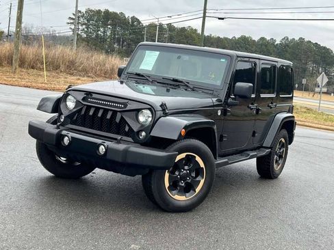 Used 2014 Jeep Wrangler Unlimited Sahara image 1