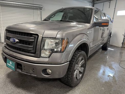 Used 2013 Ford F150 FX4 w/ Mid Equipment Group AWD/4WD image 1